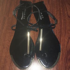 Black and gold sandals